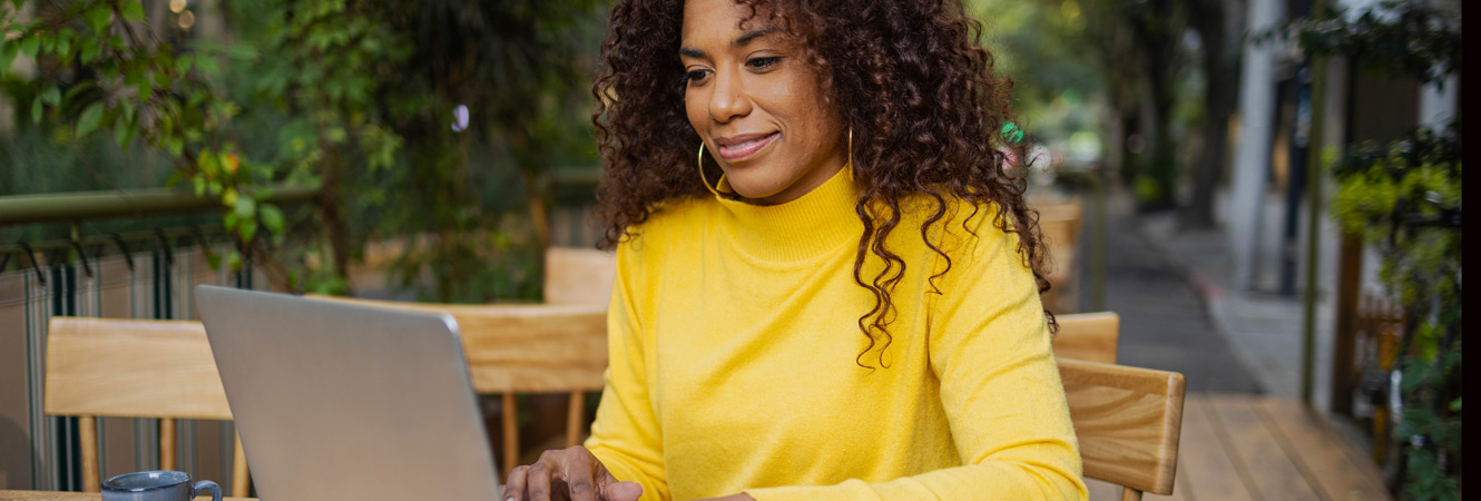 Blk woman using laptop